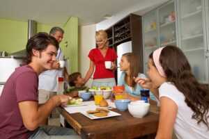 Family eating breakfast at the dining room table