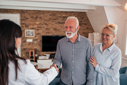 Host-Father-Shaking-Hands-to-Greet-Guest - Australian Homestay Network